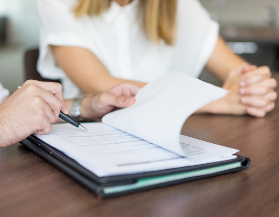 hands-of-male-executive-showing-contract-to-female-partner-at-meeting (1) hands-of-male-executive-showing-contract-to-female-partner-at-meeting (1)